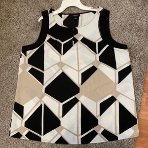Sleeveless very stylish dress top.